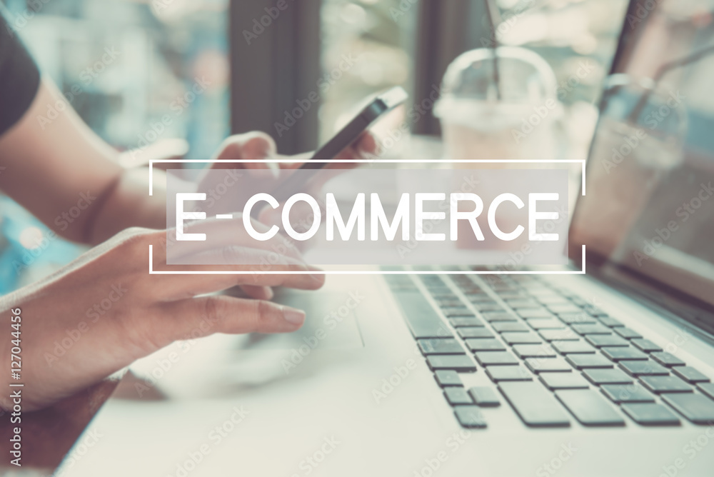 Canvas Prints business hand typing on a laptop keyboard with e-commerce homepage on the computer screen digital em
