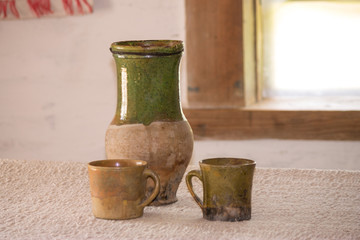 Clay jug and cups