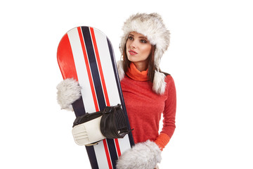 model wearing winter suit holding a snowboard