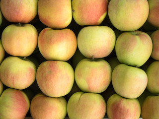 Background of green and red apples close up. Green and red apples pattern on sale at the market.