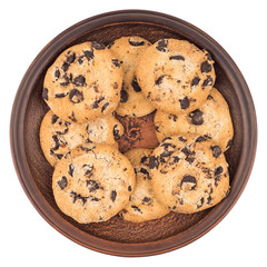 Cookies with chocolate in a brown plate. Isolated on white backg