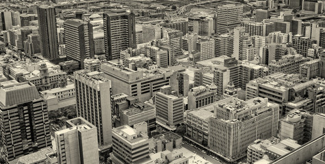 Johannesburg, South Africa - December 21, 2013: Johannesburg Central Business District has the most dense collection of skyscrapers in Africa. Johannesburg from aerial view. Old photo. Retro. Vintage