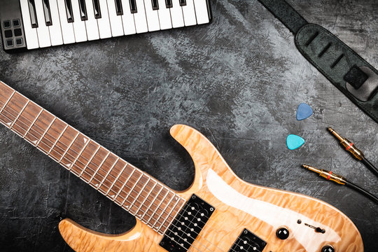 Electric guitar on grey background