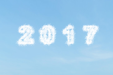 Naklejka na ściany i meble Cloud shape number 2017 on blue sky