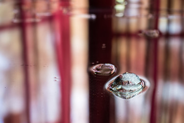 Melting ice cubes on a mirror