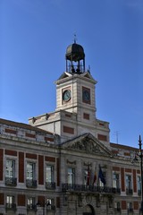 Fototapeta na wymiar Reloj de Gobernación o de la Puerta del Sol, de torre en un templete sobre la Casa de Correos, inaugurado en el año 1866 por la reina Isabel II.