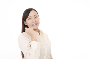 ガッツポーズの女性