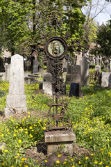 Fototapeta premium Historic Jesus on the mystery old Prague Cemetery, Czech Republic
