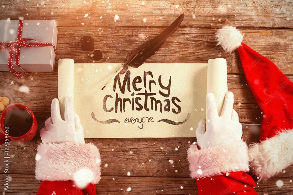 Poster composite image of close-up of santa claus opening scroll