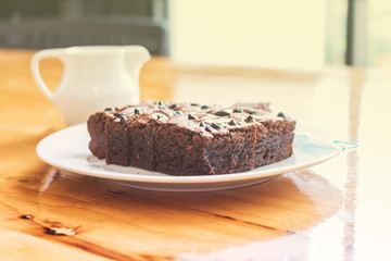Fototapeta na wymiar Cake chocolate brownies on wooden background