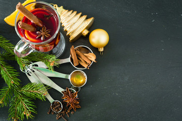 Ingredients for mulled wine on black background