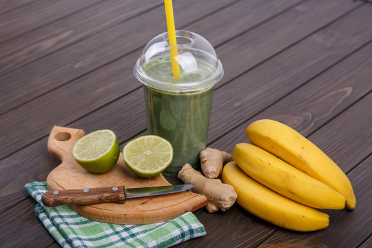 healthy smoothie with bananas,lime and ginger lie on the table