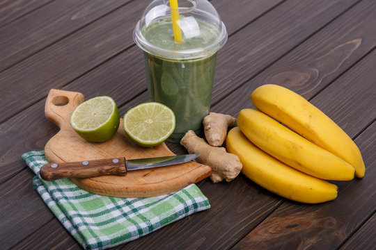 healthy smoothie with bananas,lime and ginger lie on the table