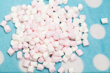 rash marshmallow on a blue background