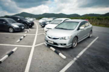 Fototapeta na wymiar Car parking on blur background,Blur scene.