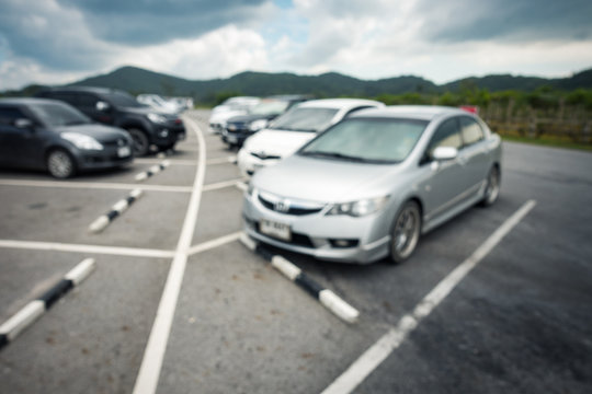 Car parking on blur background,Blur scene.