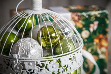 Fototapeta premium Gift present and green christmas balls. New Year decoration.