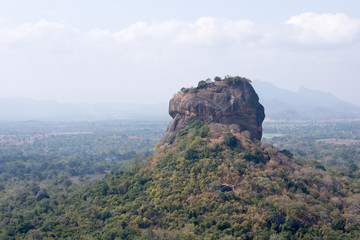 Fototapeta na wymiar Sigiriya Lion Rock view from Pidurangala Rock Temple, Sri Lanka.