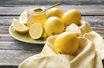 Jam of lemons and fresh lemon fruits. Close-up