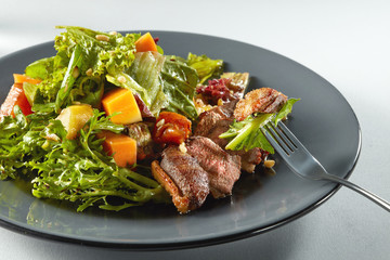 salad with pumpkin on white background