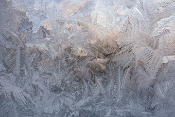 Winter patterns on glass from ice