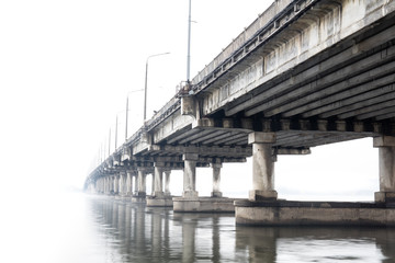 Bridge on foggy morning in Dnepr, Ukraine