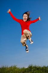 Fototapeta na wymiar Girl running, jumping outdoor 