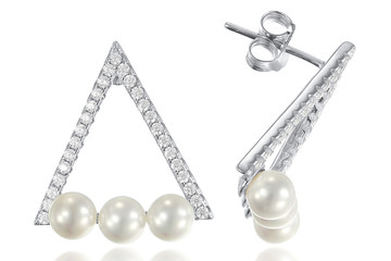 Silver earrings on white background