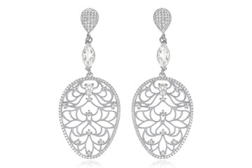 Silver earrings on white background