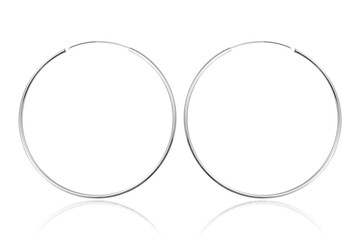 Silver earrings on white