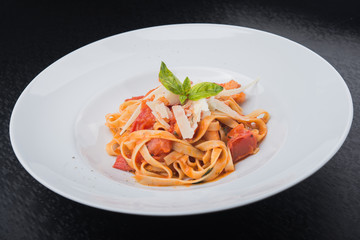 italian pasta with meat, tomato and cheese