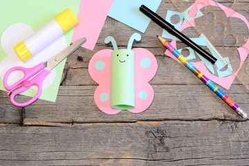 Lovely paper butterfly crafts, scissors, marker, glue stick, colored paper and scraps, ruler,...