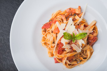 italian pasta with meat, tomato and cheese