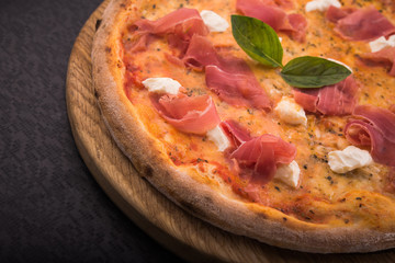 italian pizza with prosciutto and cheese