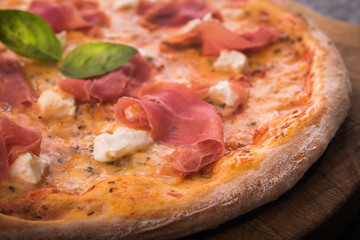 italian pizza with prosciutto and cheese