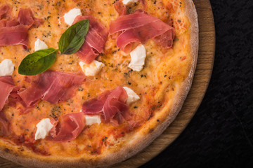 italian pizza with prosciutto and cheese