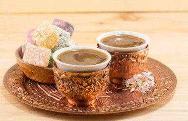 Coffee and Turkish delight in a copper cups
