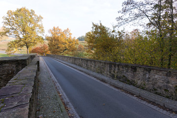 Old small stone bridge over the river