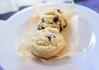 Cookies on a white plate in coffee shop