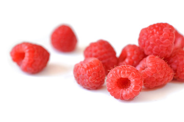 Raspberries close up on white background - isolated