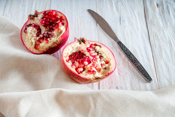 Sliced pomegranate on white background