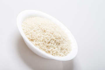 Bowl full of rice on white 