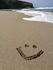 smiley face at the beach