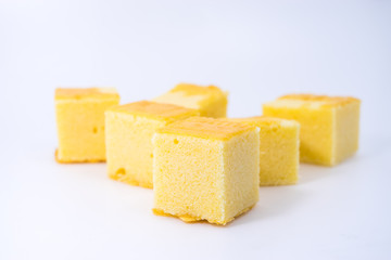 square butter cake on white background. square butter cake stack. butter cake on white.