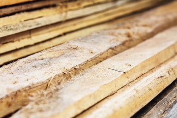 Large stack of wood planks