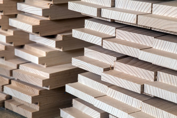 timber, wood building material for background and texture. details wood production spike. composition wood products. abstract background. small depth of field