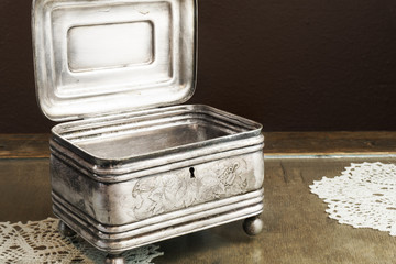 Silver Casket, jewelry/trinket box on retro table