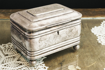 Silver Casket, jewelry/trinket box on retro table