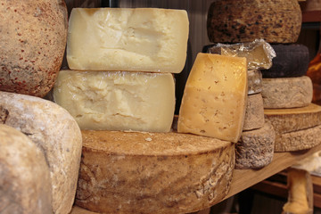 Selection of Different Types of Cheese and Wine Bottle