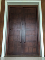 Big brown wooden door. / Mobile photography